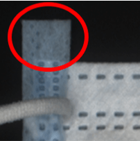 Defective mask with protrusion detected by AI