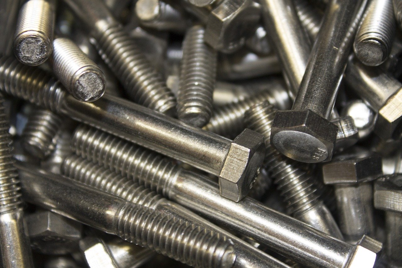 pile of shiny metal bolts