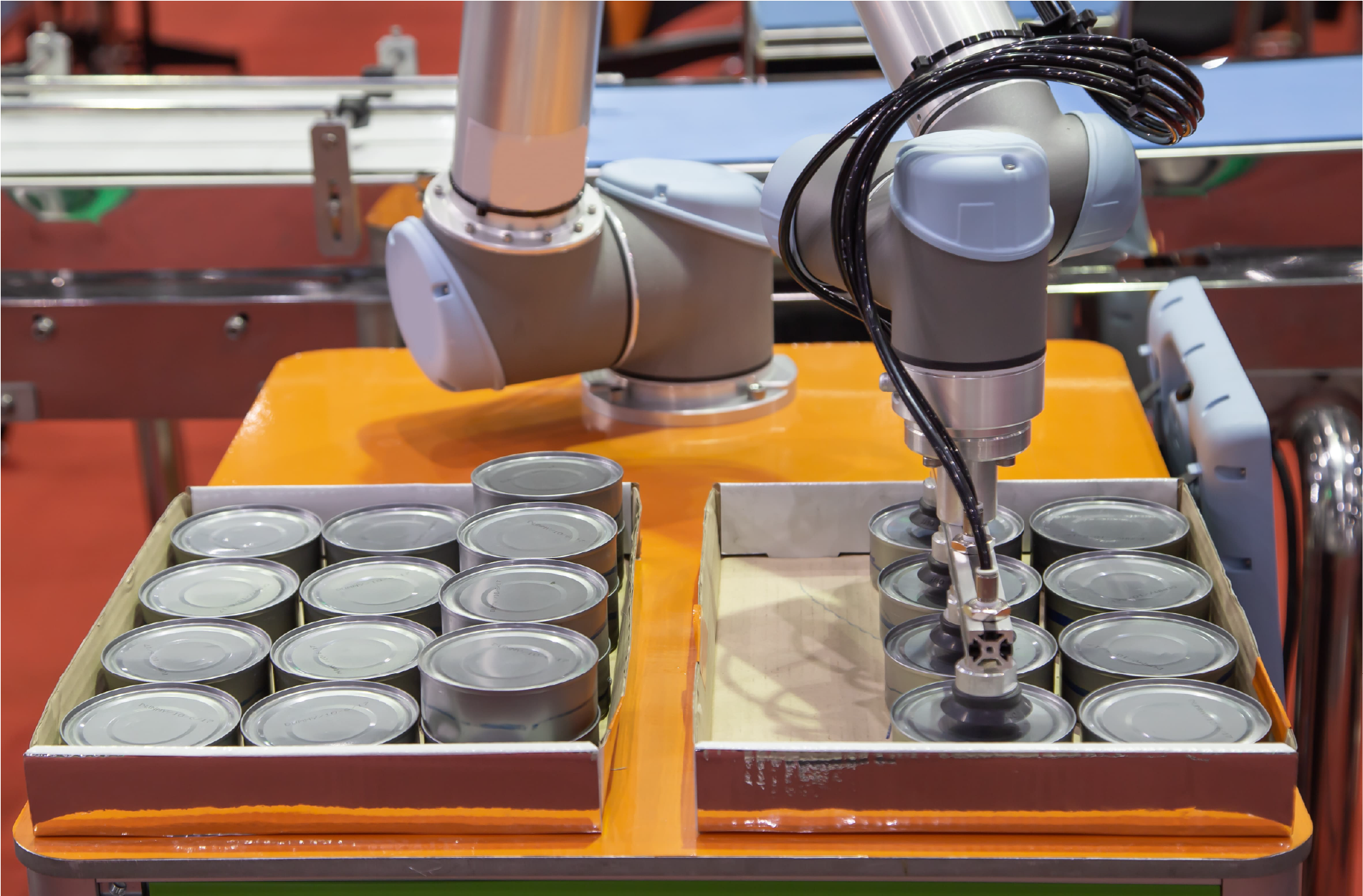 pick and place tin cans on a production line using a UR robot arm