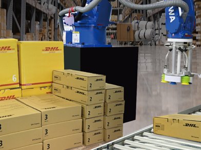 Yaskawa robot with a vacuum gripper performing automated depalletizing of stacked DHL shipping boxes in a logistics center, guided by AccuPick AI vision for precise package handling.