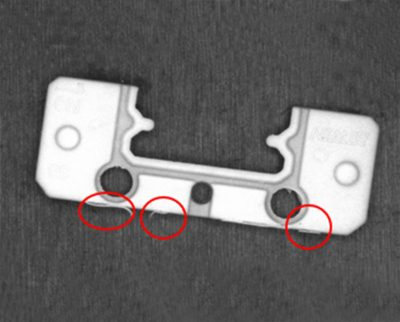Mold crush defects on a rubber injection molding part