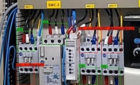 AI inspection of a wiring panel showing incorrect cable placement