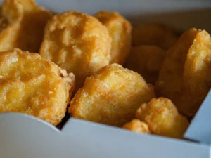 Chicken nuggets shown as the inspection object in an AI-based processed food inspection application.