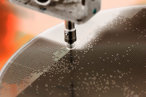 close up of semiconductor wafer being fabricated