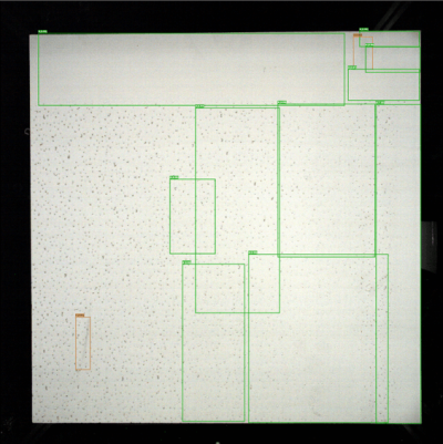 SolVision AI identifies surface defects on a drywall panel using bounding boxes to highlight scratches and physical damage during automated inspection.