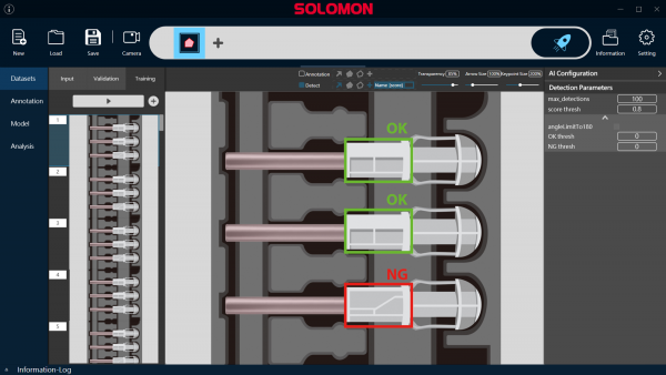 Interfaz de SolVision IA para la Inspección de Agujas de Seguridad Interfaz del sistema de visión por IA SolVision para la inspección de agujas de seguridad, mostrando detección de defectos OK/NG en tiempo real en agujas de seguridad diseñadas con mecanismos de protección.