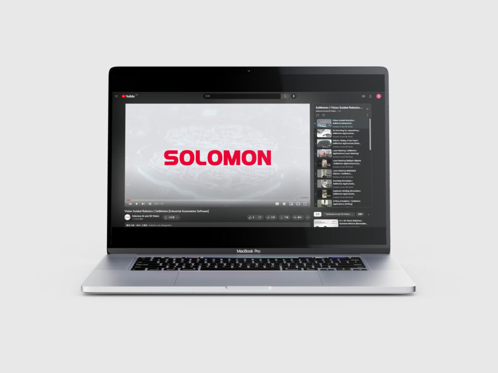 Rendering CGI di uno schermo aperto di un computer portatile che guarda il canale YouTube di Solomon AI and 3D Vision, che rappresenta dei video.
