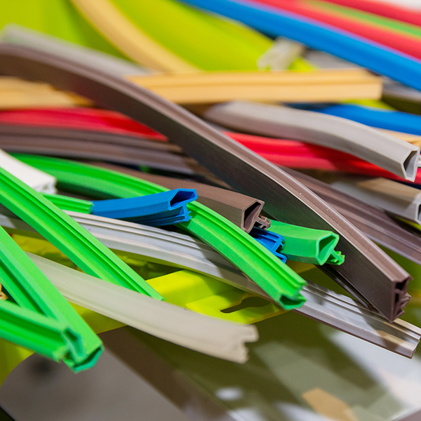 a bunch of different colored rubber cables on a table